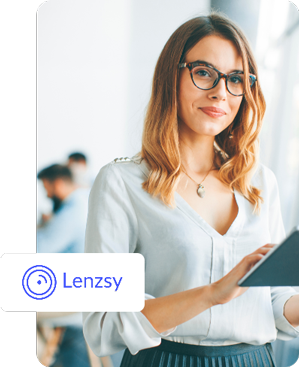 A woman holding a tablet with the Lenzsy logo on a blurred background.